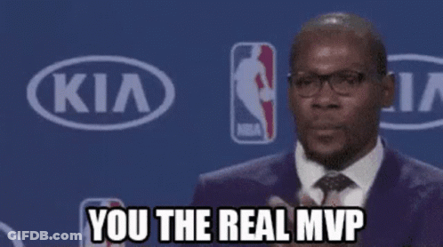 A Man In A Suit And Tie Says You The Real Mvp In Front Of A Kia Logo GIF