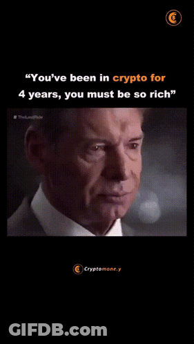 A Man In A Suit And Tie Says " You 'Ve Been In Crypto For 4 Years , You Must Be So Rich . " GIF