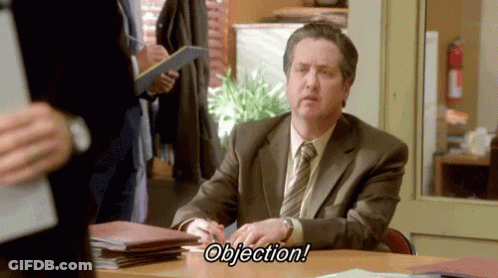 Man In Suit And Tie With Objection Sign GIF