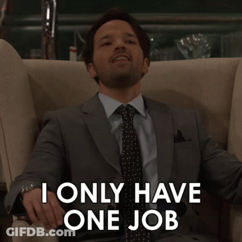 A Man In A Suit And Tie Sits In A Chair And Says " I Only Have One Job " GIF