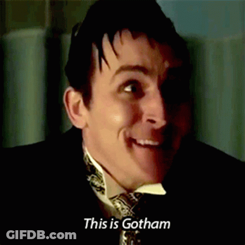 A Man In A Suit And Tie Smiles And Says This Is Gotham GIF