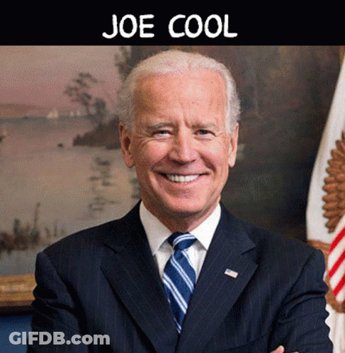 Man In Suit Smiling In Front Of Flag Joe Cool Text GIF