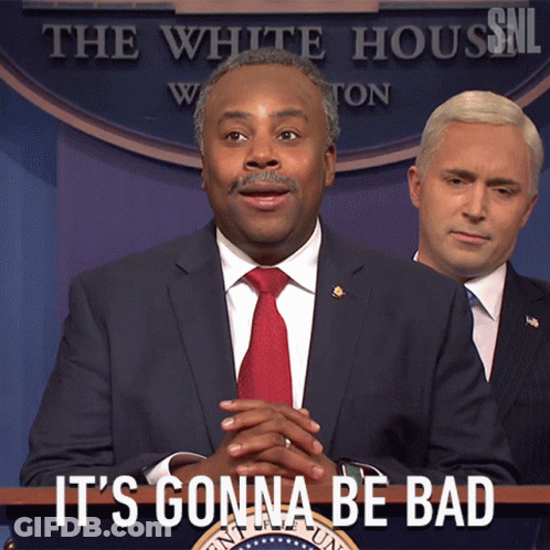 A Man In A Suit And Tie Stands At A Podium With The Words " It 'S Gonna Be Bad " Above Him GIF
