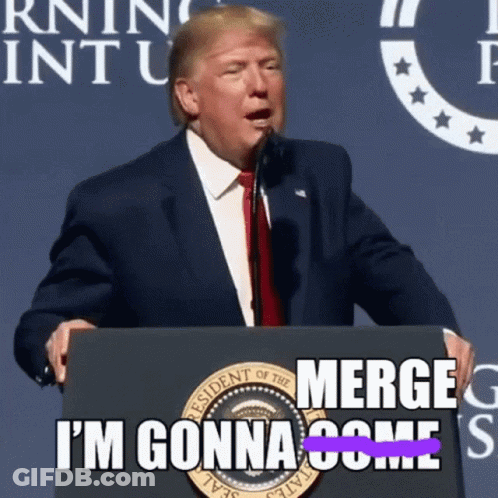 A Man In A Suit And Tie Stands At A Podium With The Words Merge I 'M Gonna Come GIF