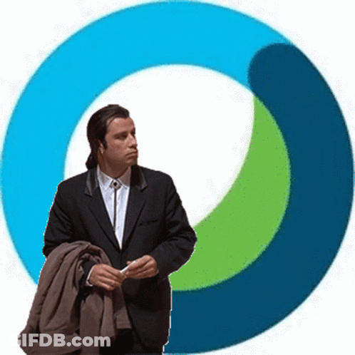 A Man In A Suit And Tie Stands In Front Of A Blue And Green Circle GIF