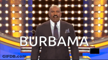 A Man In A Suit And Tie Stands In Front Of A Screen That Says " Burbama " GIF