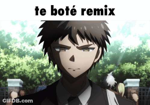 A Man In A Suit And Tie Stands In Front Of A Sign That Says Te Bote Remix GIF
