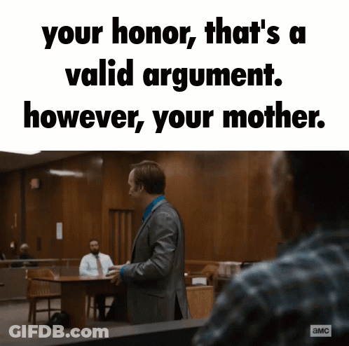 A Man In A Suit And Tie Stands In Front Of A Table With The Words Your Honor That 'S A Valid Argument GIF