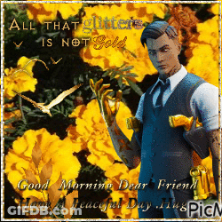 A Man In A Suit And Tie Stands In Front Of Yellow Flowers GIF
