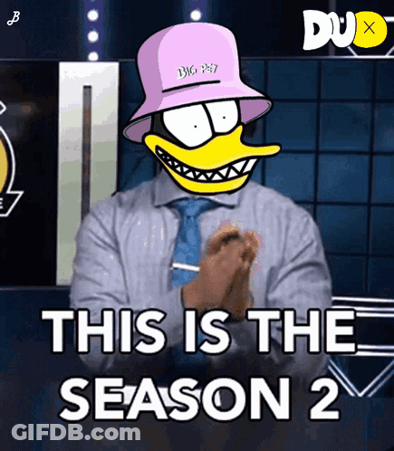 Man In Suit And Tie With Cartoon Duck GIF