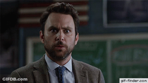 A Man In A Suit And Tie With A Gif-Finder.com Logo On The Bottom GIF