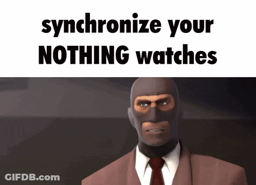A Man In A Suit And Tie With A Mask On His Face Says Synchronize Your Nothing Watches GIF