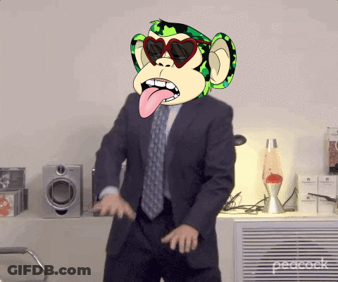 A Man In A Suit And Tie With A Monkey Mask On His Head GIF