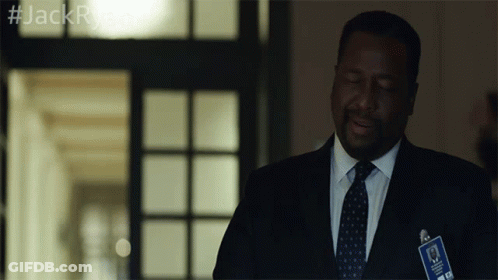 A Man In A Suit And Tie With A Name Tag That Says Jack GIF