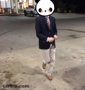 A Man In A Suit And Tie With A Panda Face On His Face GIF
