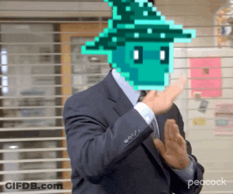 A Man In A Suit And Tie With A Pixelated Character On His Head GIF