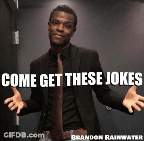 A Man In A Suit And Tie With Come Get These Jokes Brandon Rainwater GIF