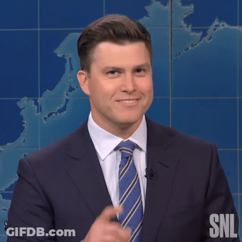 A Man In A Suit And Tie With Snl Written On The Bottom GIF