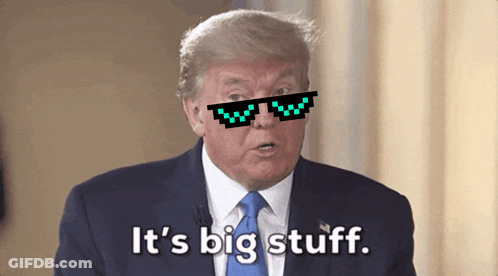 A Man In A Suit And Tie With Sunglasses On Says It 'S Big Stuff GIF