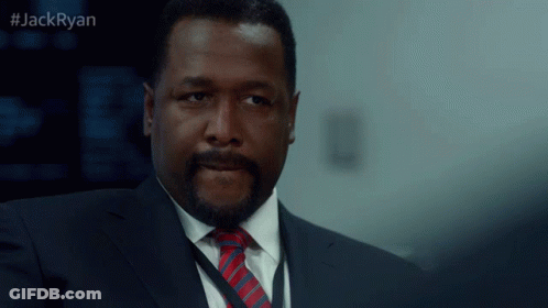 A Man In A Suit And Tie With The Hashtag Jackryan GIF