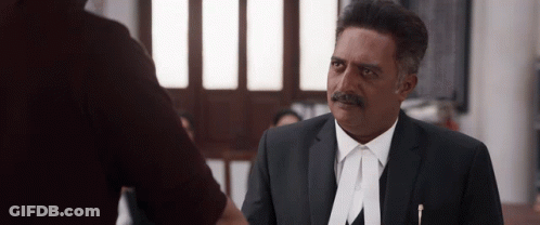 Man In Suit And Tie With A On Shirt GIF
