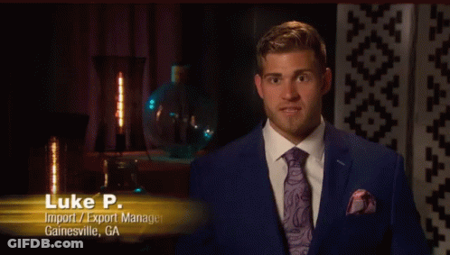 A Man In A Suit And Tie With The Name Luke P. GIF
