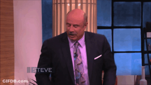 A Man In A Suit And Tie With The Name Steve On The Bottom GIF