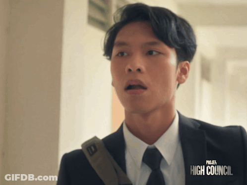 A Man In A Suit And Tie With The Word High Council On The Bottom GIF