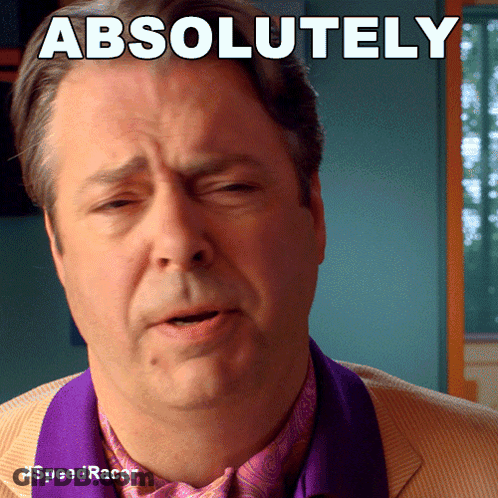 A Man In A Suit And Tie With The Words Absolutely Above Him GIF