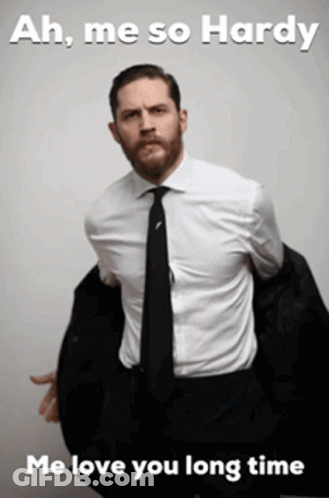A Man In A Suit And Tie With The Words Ah Me So Hardy Me Love You Long Time Below Him GIF
