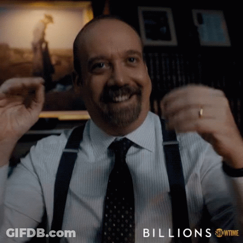 A Man In A Suit And Tie With The Words Billions Showtime Below Him GIF