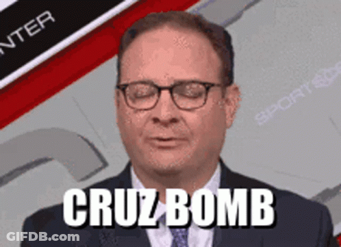 A Man In A Suit And Tie With The Words Cruz Bomb Written On His Face GIF