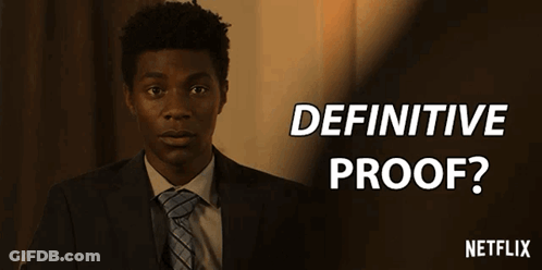 A Man In A Suit And Tie With The Words Definitive Proof Written Above Him GIF