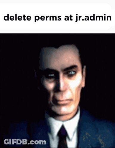 A Man In A Suit And Tie With The Words " Delete Perms At Jr.admin " Above Him GIF