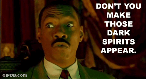 A Man In A Suit And Tie With The Words " Do N't You Make Those Dark Spirits Appear " On The Bottom GIF
