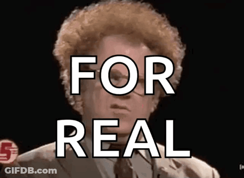 A Man In A Suit And Tie With The Words For Real Above Him GIF