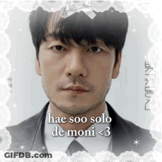 A Man In A Suit And Tie With The Words Hae Soo Solo De Moni < 3 Above His Face GIF
