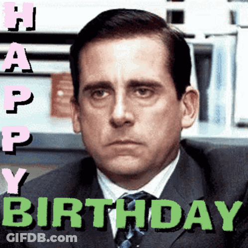 A Man In A Suit And Tie With The Words Happy Birthday Above Him GIF