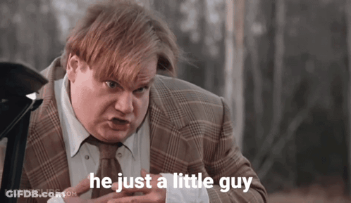 A Man In A Suit And Tie With The Words He Just A Little Guy Above Him GIF