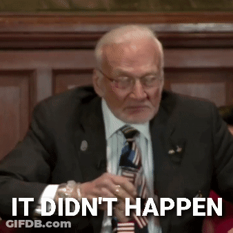 A Man In A Suit And Tie With The Words It Did N't Happen Below Him GIF