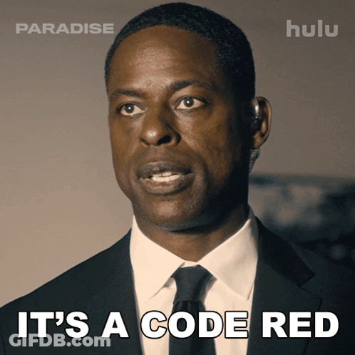 A Man In A Suit And Tie With The Words It 'S A Code Red GIF