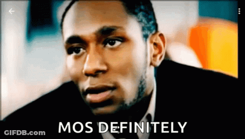 A Man In A Suit And Tie With The Words " Mos Definitely " Next To Him GIF