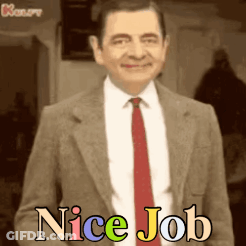 A Man In A Suit And Tie With The Words Nice Job Written Below Him GIF