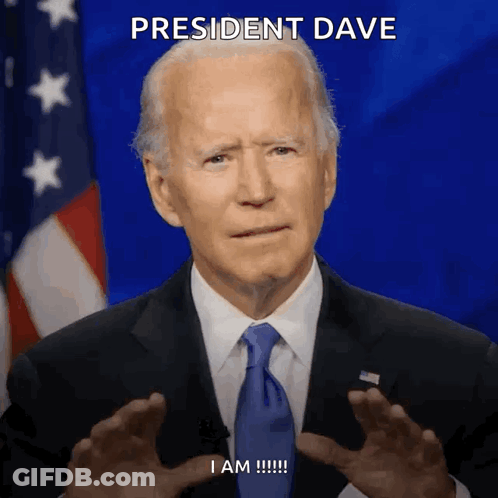 Man In Suit And Tie With President Dave GIF