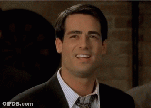 A Man In A Suit And Tie With The Words Prove It Above Him GIF