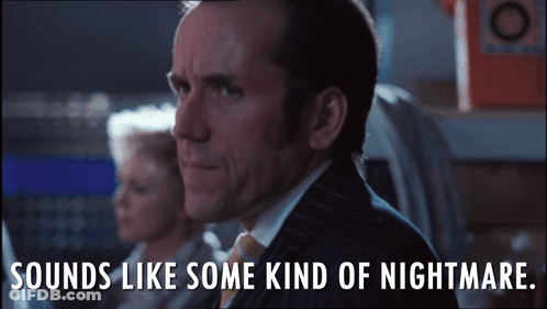 A Man In A Suit And Tie With The Words Sounds Like Some Kind Of Nightmare Below Him GIF