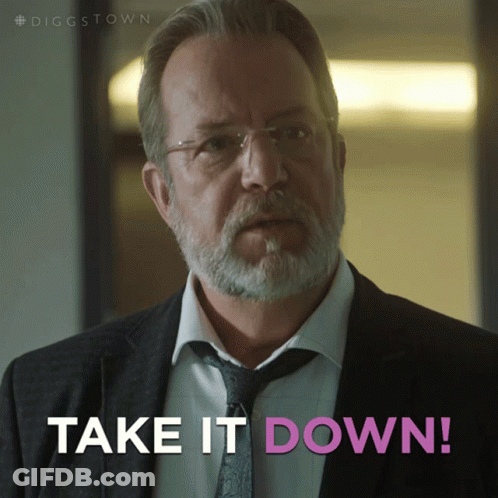 A Man In A Suit And Tie With The Words Take It Down Below Him GIF