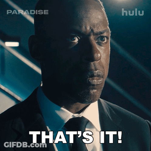 A Man In A Suit And Tie With The Words That 'S It On His Face GIF