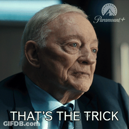 A Man In A Suit And Tie With The Words That 'S The Trick Below Him GIF