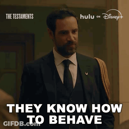A Man In A Suit And Tie With The Words " They Know How To Behave " GIF